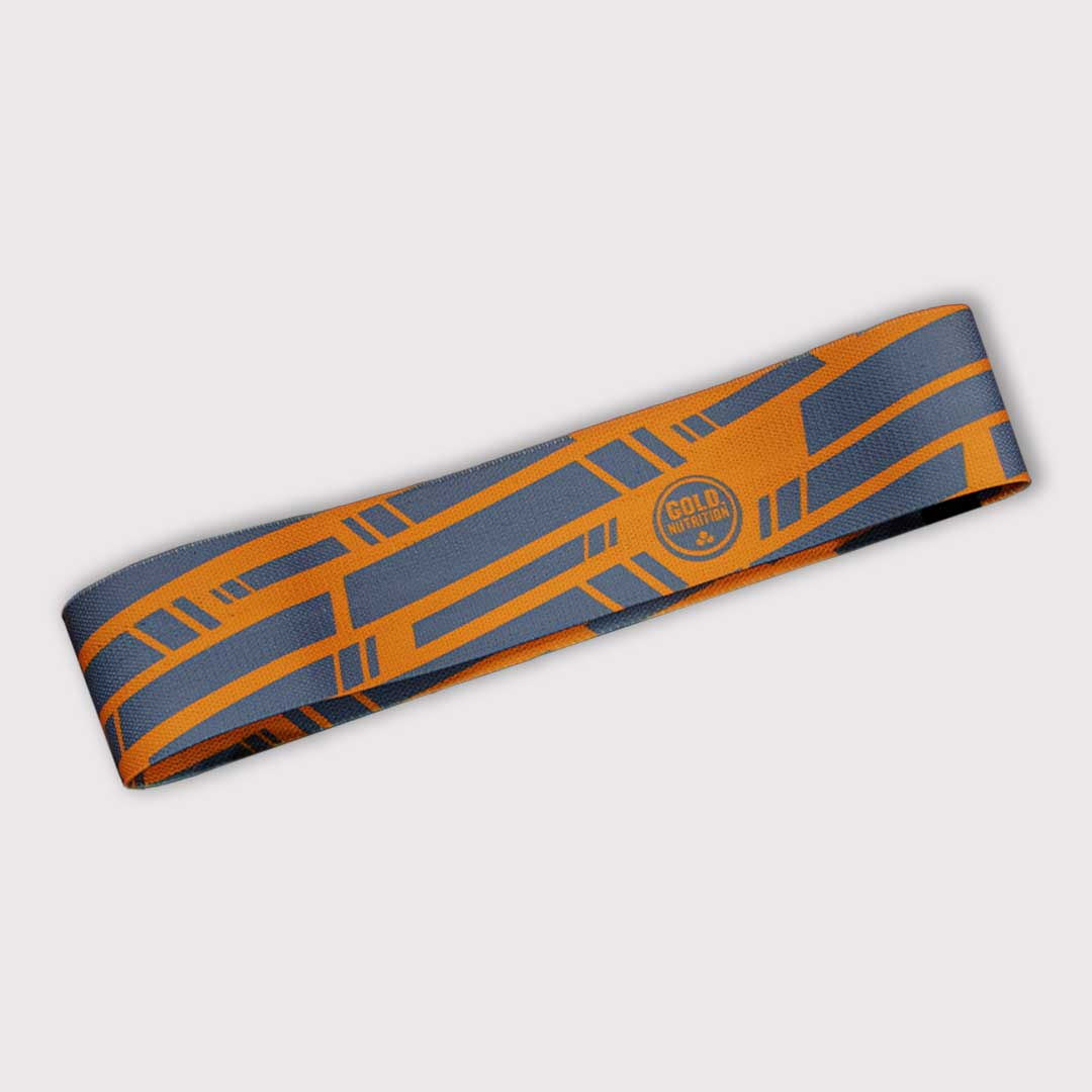 Faixa de resistência mini da GoldNutrition, em cores variadas, usada para exercícios de fortalecimento muscular.